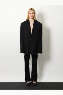 Balenciaga women’s black washed SB viscose oversized blazer with single button closure and wide structured lapels