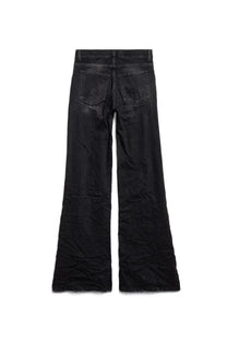 Balenciaga women’s black denim wide leg pants with a worn distressed finish shown from the back