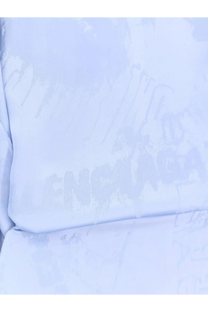 Balenciaga women’s wrap silk mini dress in light blue textured fabric with faint faded lettering across the surface