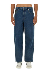 Dark blue denim Bally men’s baggy fit jeans with relaxed wide-leg cut and classic five-pocket design