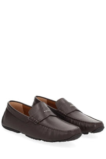 Brown leather bally men’s moccasin driver pilot loafers with textured surface and subtle stitching details