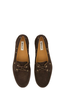 Bally men’s moccasin pathy brown boat shoes in brown suede with tan lining and gold toned eyelets