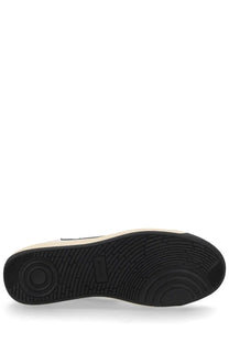 Black rubber sole with textured circular tread and cream midsole of bally men’s sneaker competition white