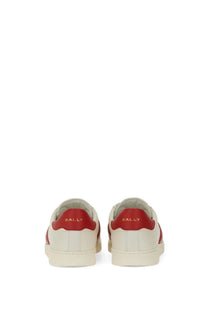 Cream-colored bally men’s tyger sneaker with red leather accents and gold branding on the heel back side