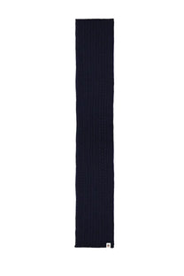 A navy blue ribbed knit wool scarf for men by Bally with subtle texture and a small white tag at the bottom