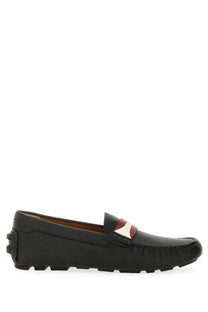 Bally women’s driver kerbs black leather loafers with a contrasting red and white stripe across the vamp