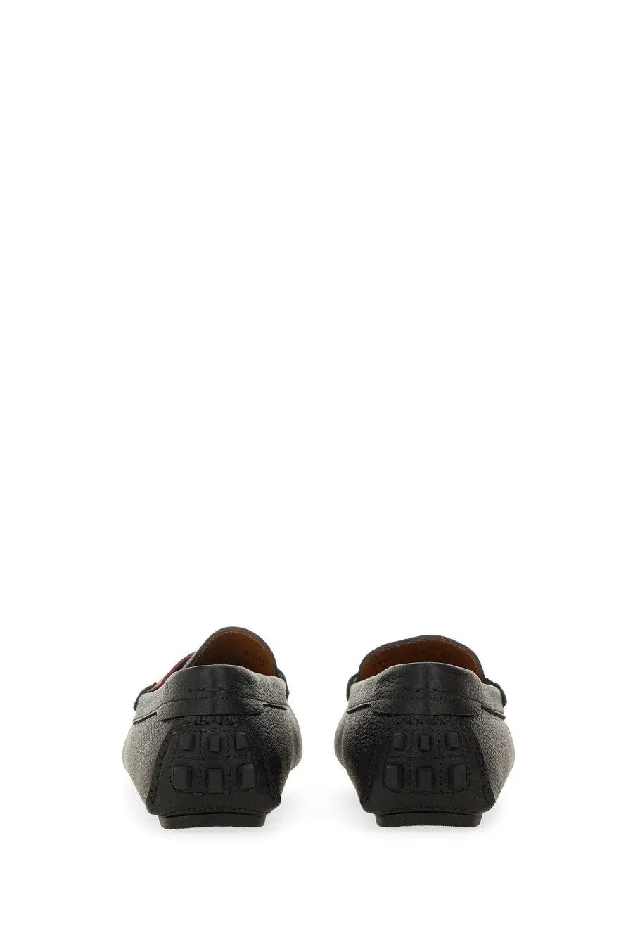 Black leather Bally women’s driver kerbs loafers with textured finish and embossed logo on the back heel