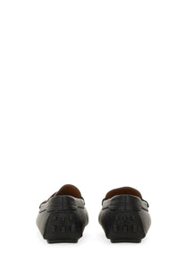 Black leather Bally women’s driver kerbs loafers with textured finish and embossed logo on the back heel