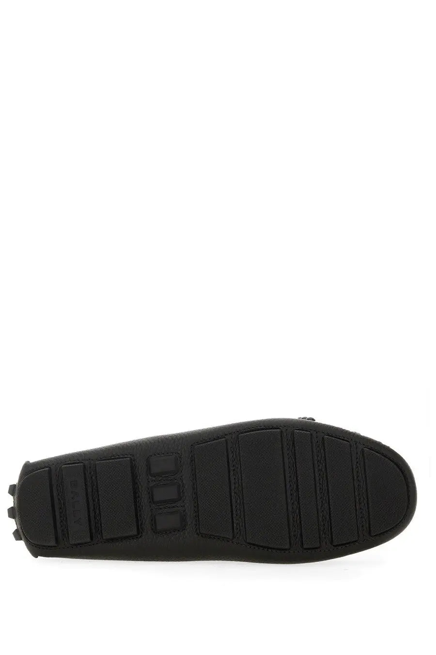 Black rubber sole of bally women’s driver kerbs black shoe with textured grip pattern and embossed brand logo