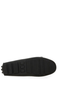 Black rubber sole of bally women’s driver kerbs black shoe with textured grip pattern and embossed brand logo