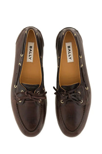 Brown leather bally womens moccasin pathy boat shoes with gold-toned eyelets and laces