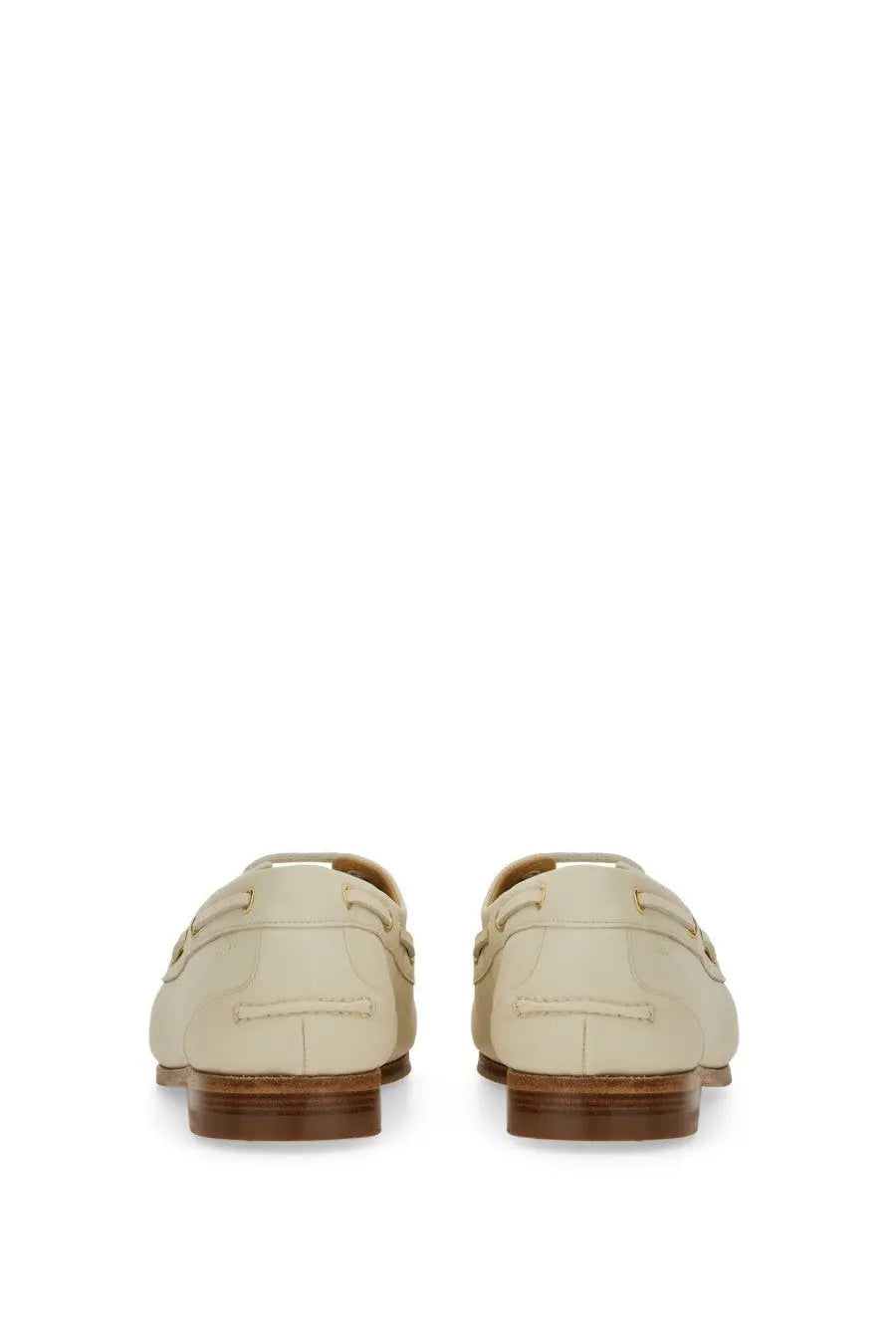 Bally women’s moccasin pathy white cream-colored leather loafers with classic moccasin design and brown rubber soles