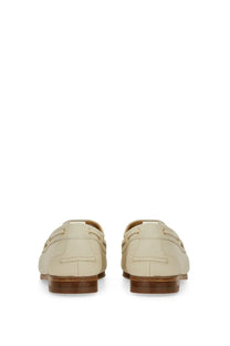 Bally women’s moccasin pathy white cream-colored leather loafers with classic moccasin design and brown rubber soles