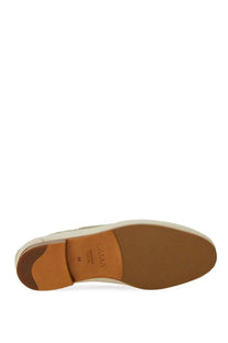 Tan leather sole with textured rubber outsole and visible brand stamp on bally womens moccasin pathy white
