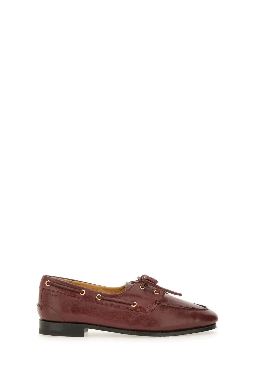 Bally women’s moccasin plume brown burgundy leather boat shoe with gold tone eyelets and bow at the toe