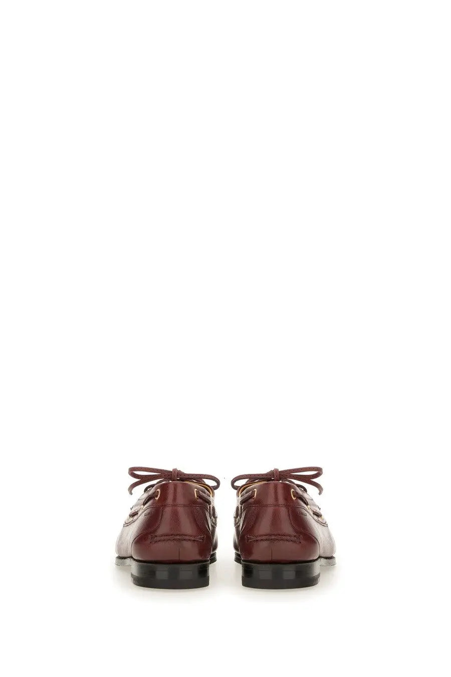 Bally women’s moccasin plume brown burgundy leather boat shoes with black rubber soles and matching laces