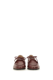 Bally women’s moccasin plume brown burgundy leather lace-up loafers with sleek polished finish and black soles