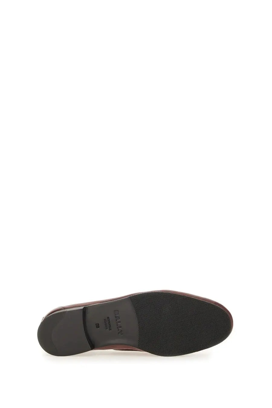Back side of a burgundy leather oxford shoe with a black rubber sole and embossed brand logo on the heel by bally