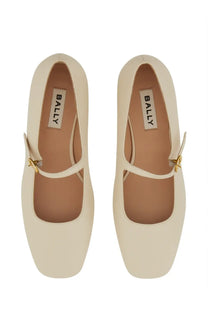 Bally women’s cream leather mary jane flats with square toes and gold-tone buckle accents