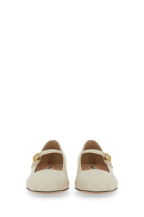 Bally women’s cream-colored suede mary jane flats with gold-tone buckle details in leather white