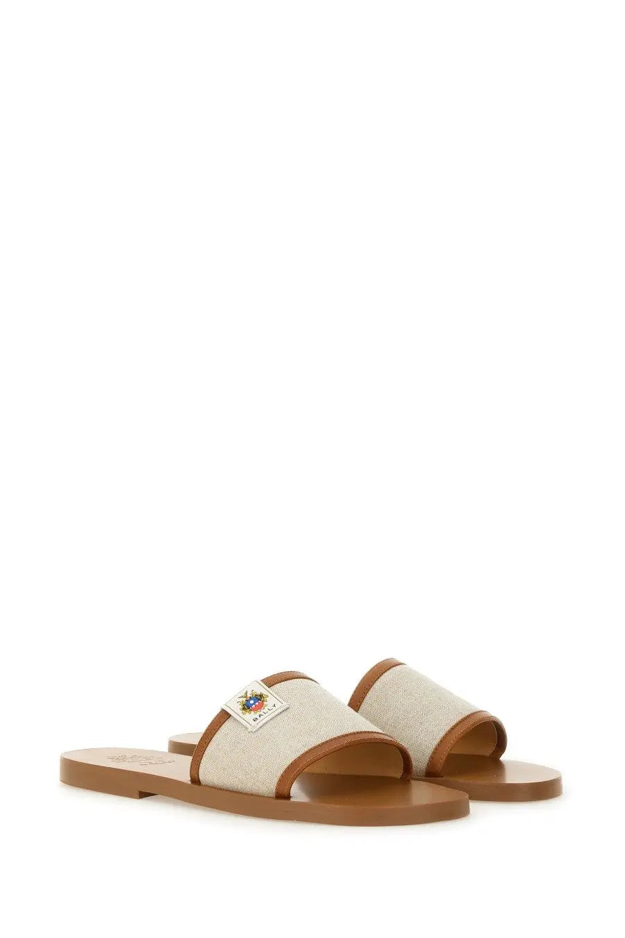 Bally women’s slide sandal sollie beige with beige canvas base brown leather straps and small embroidered patch on strap