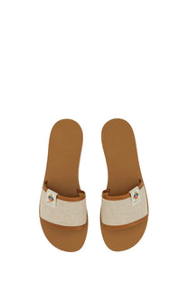 Bally women’s slide sandal sollie beige with beige canvas straps tan rubber soles and embroidered logo patch on strap