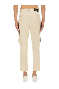 Beige Balmain men’s cotton cargo pants with a sleek straight-leg cut and subtle side pockets