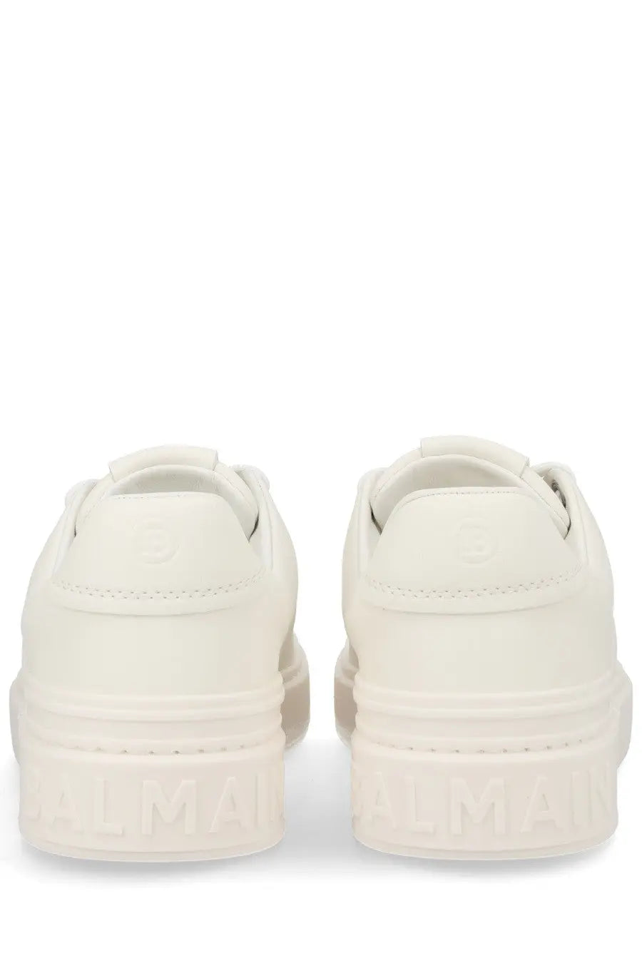 Balmain men’s court sneaker white platform sneakers with sleek minimalist design and embossed branding on soles