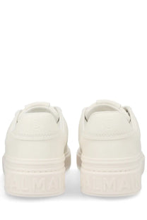 Balmain men’s court sneaker white platform sneakers with sleek minimalist design and embossed branding on soles