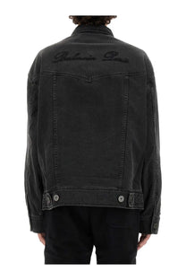 Balmain men’s black denim jacket showing the back with balmain paris embroidered in dark thread