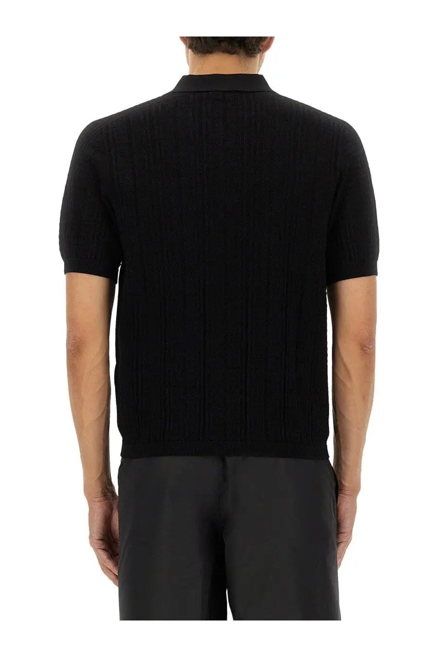 Balmain men’s knitted polo black ribbed knit with short sleeves and classic collar in front view