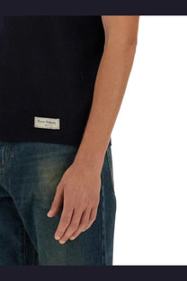 Black ribbed knit sleeveless top with pierre balmain paris label at hem for balmain mens merino wool polo shirt blue
