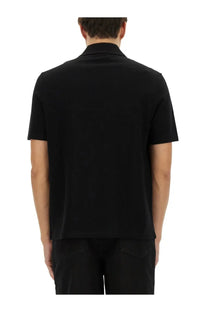 Balmain men’s polo black short-sleeved shirt with classic collar and smooth fitted fabric
