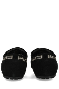 Balmain men’s racer sneaker black featuring black suede loafers with a silver greek key pattern on the strap