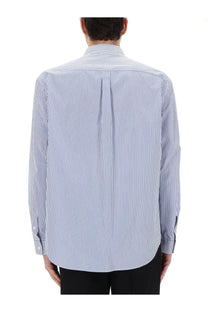 Balmain men’s shirt blue long-sleeved button-down with crisp blue and white vertical stripes and tailored fit with back pleats