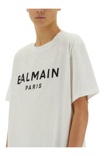 White balmain paris t-shirt with bold black lettering across the chest made of soft cotton for men
