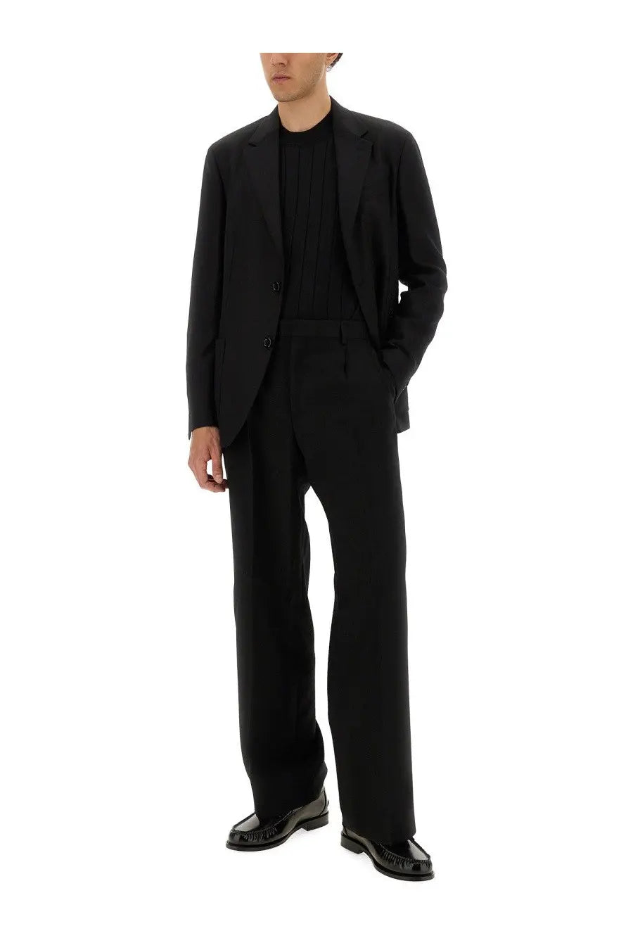 Balmain men’s black tailored blazer with silk and cotton knit fabric featuring a sleek minimalist design and subtle texture
