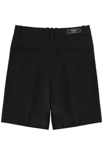 Black wool pleated tailored shorts for men by Balmain with a fitted waistband and brand label visible