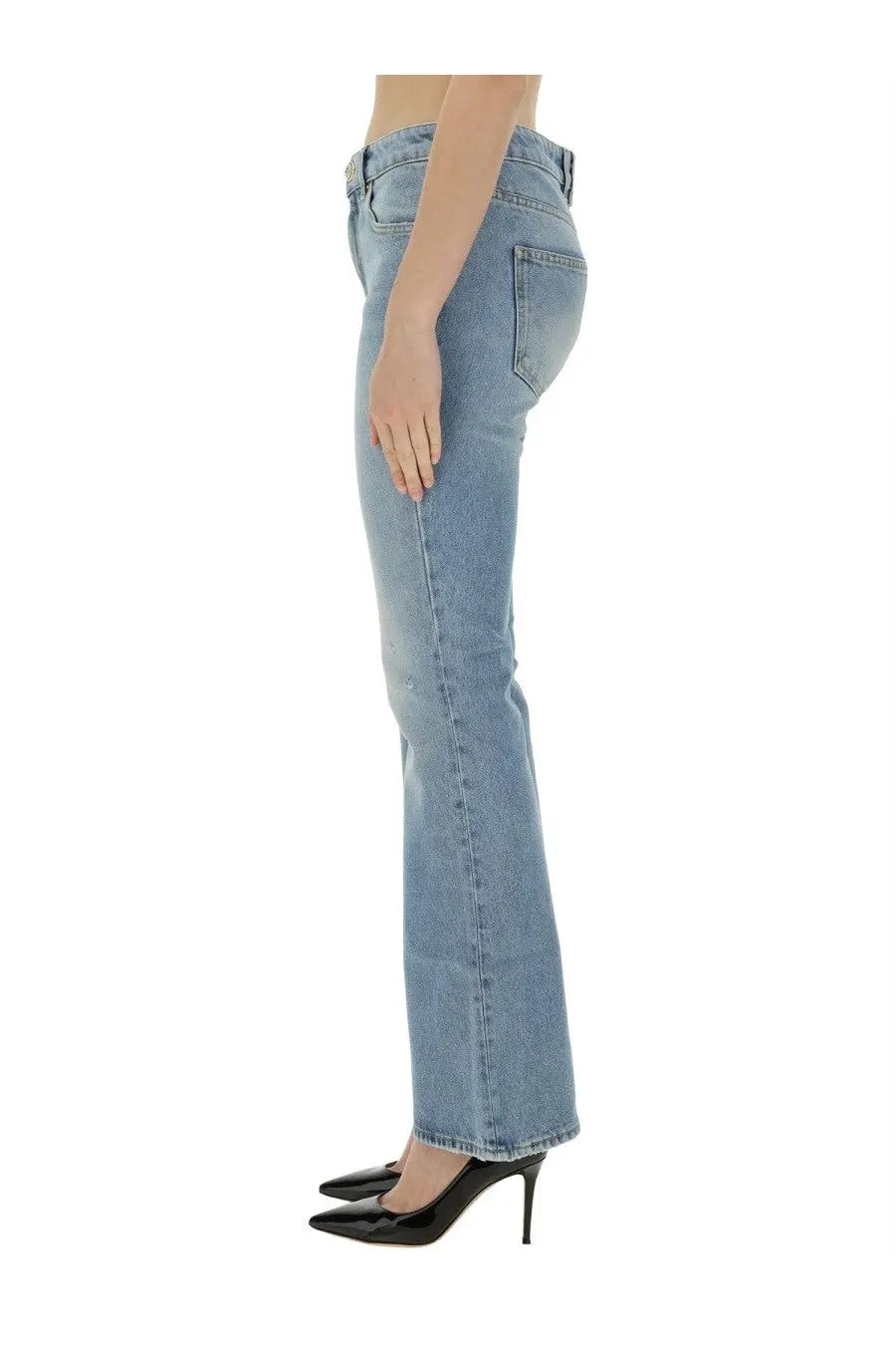 Balmain women’s light-wash denim flare jeans with classic five-pocket design and subtle fading for a worn-in look