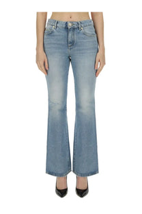 Balmain women’s blue light-wash denim flare jeans with subtle distressing at the knees