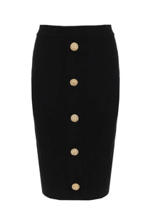 Balmain women’s black midi pencil skirt with five ornate gold toned buttons down the front