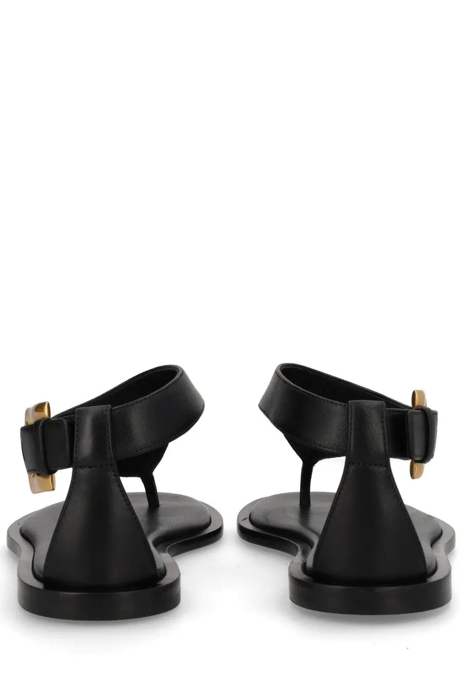 Balmain women’s black leather sandals with gold-tone buckle accents and open toe design