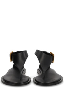 Balmain women’s black leather thong sandals with gold-tone rectangular buckles and open toe design