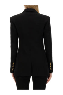 Black tailored balmain women’s single breasted jacket with gold-tone buttons on cuffs and shoulders