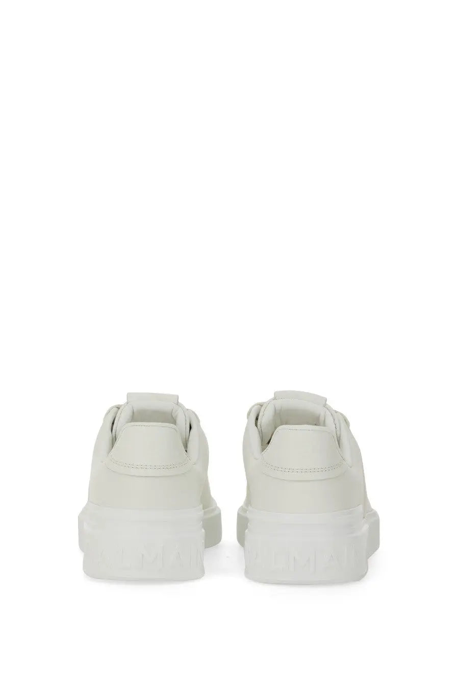 Balmain women’s white leather sneakers with a chunky sole and minimalist design