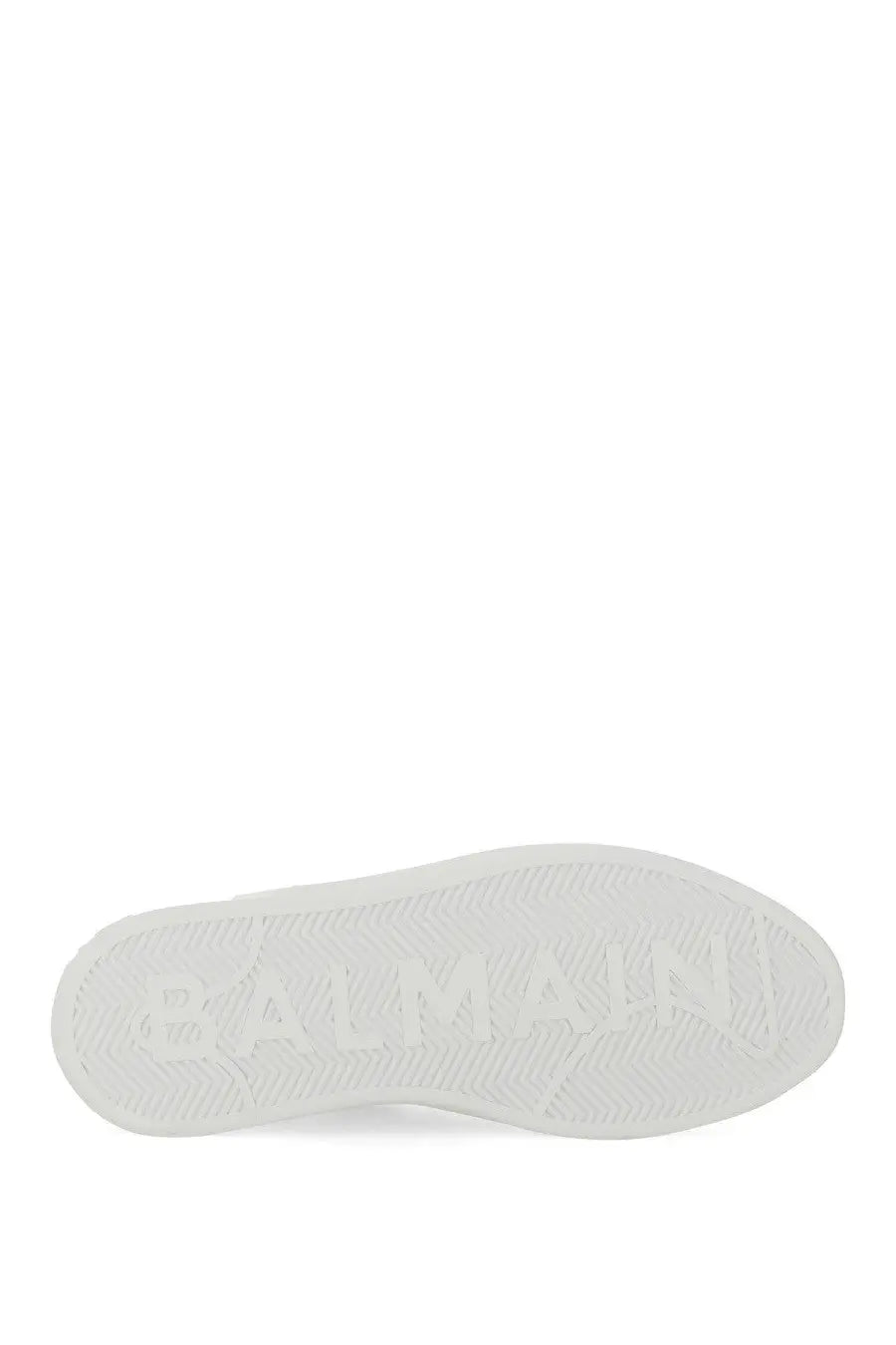Balmain women’s sneaker court white showing white rubber sole with embossed balmain logo on the back side