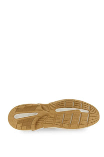 Balmain women’s sneaker dr4g0n white with tan rubber sole textured grid tread and two elongated white accents