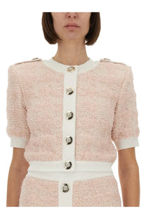 Balmain women’s blush pink tweed cropped cardigan with white ribbed trim and gold toned buttons