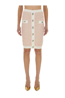 Balmain women’s pink tweed pencil skirt with white trim and silver buttons down the front