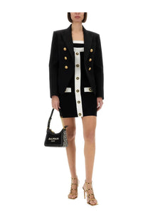 Black balmain paris handbag with gold-tone hardware and geometric pattern complementing balmain women’s two tone dress black
